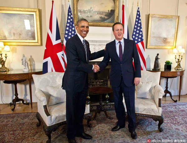 资料图:英国首相卡梅伦与美国总统奥巴马.