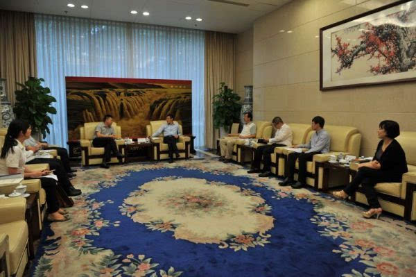 中国经济信息社总裁徐玉长会见恒大集团副总裁