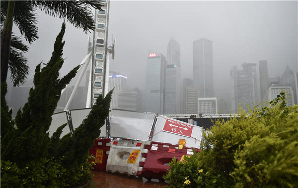八号风球悬挂16小时 台风"妮妲"渐离香港