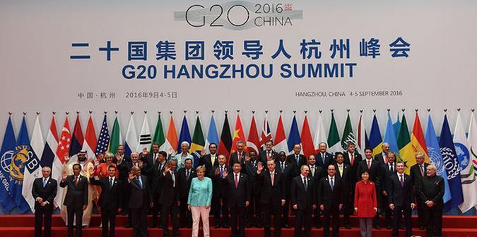 g20领导人大合影,为何这3位站最中间?