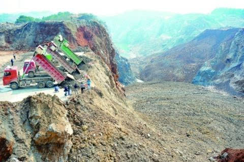 武汉最大渣土消纳场启用 两年后废弃矿坑变生态公园