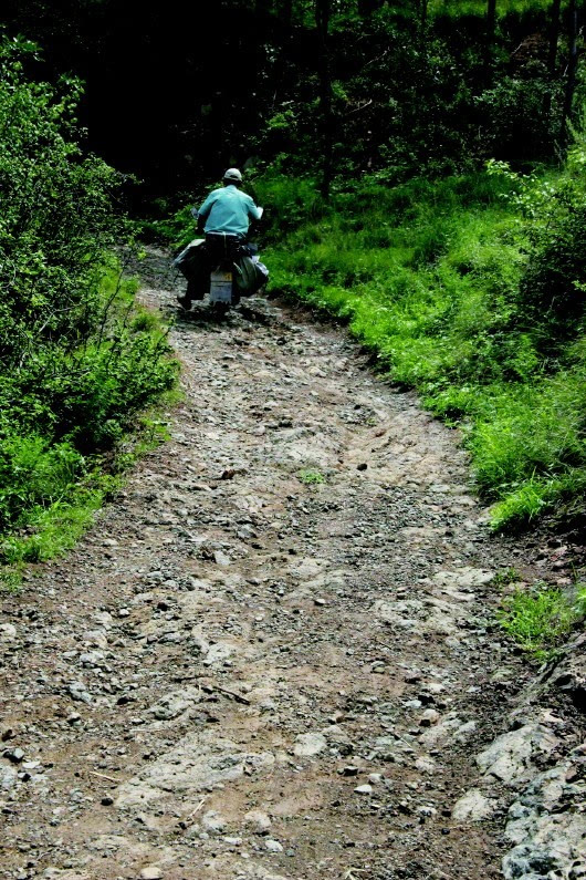 邹平南部山区山路崎岖,董乃军走过了80余万里.