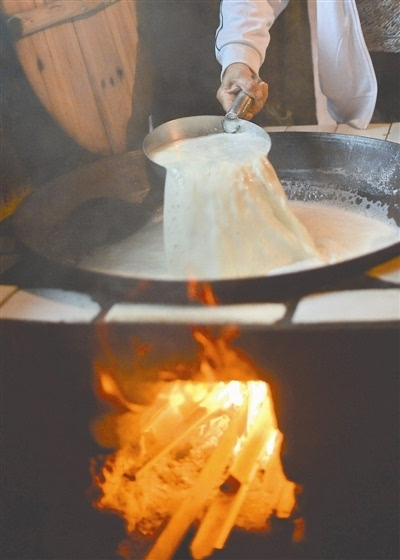 石磨豆腐飘香山寨