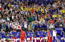 争议！中国球迷在上海穿日本球衣为日本队助威：20年前不敢想