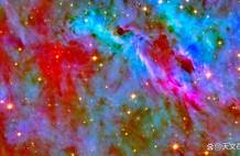 NASA哈勃捕捉到绚丽红白蓝色恒星诞生区