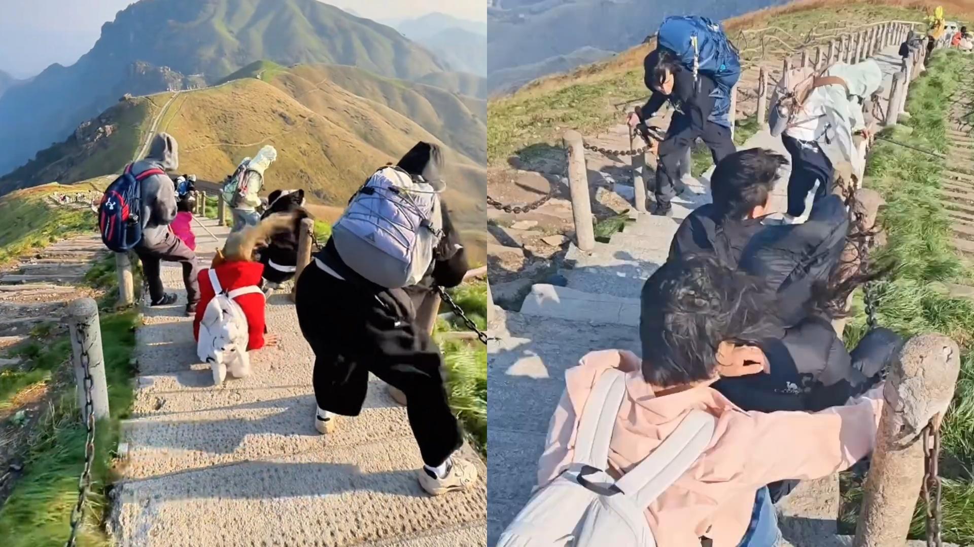 武功山遭遇大风天气，多名徒步游客紧抓护栏、铁链避险，亲历者：男生站不稳，女生不敢动