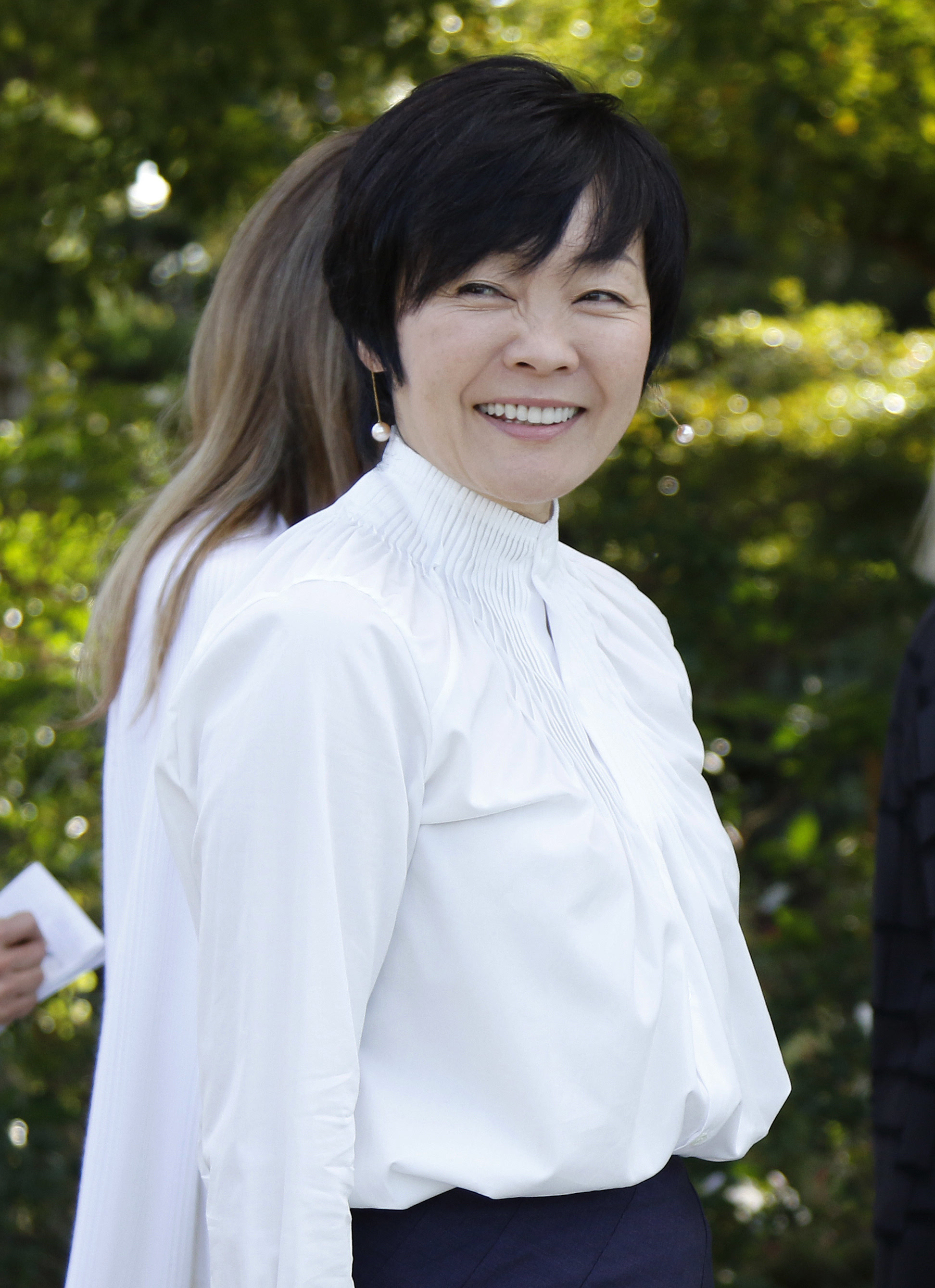 日本媒体23日报道,学校网站主页上原先有安倍昭惠的照片和致辞.