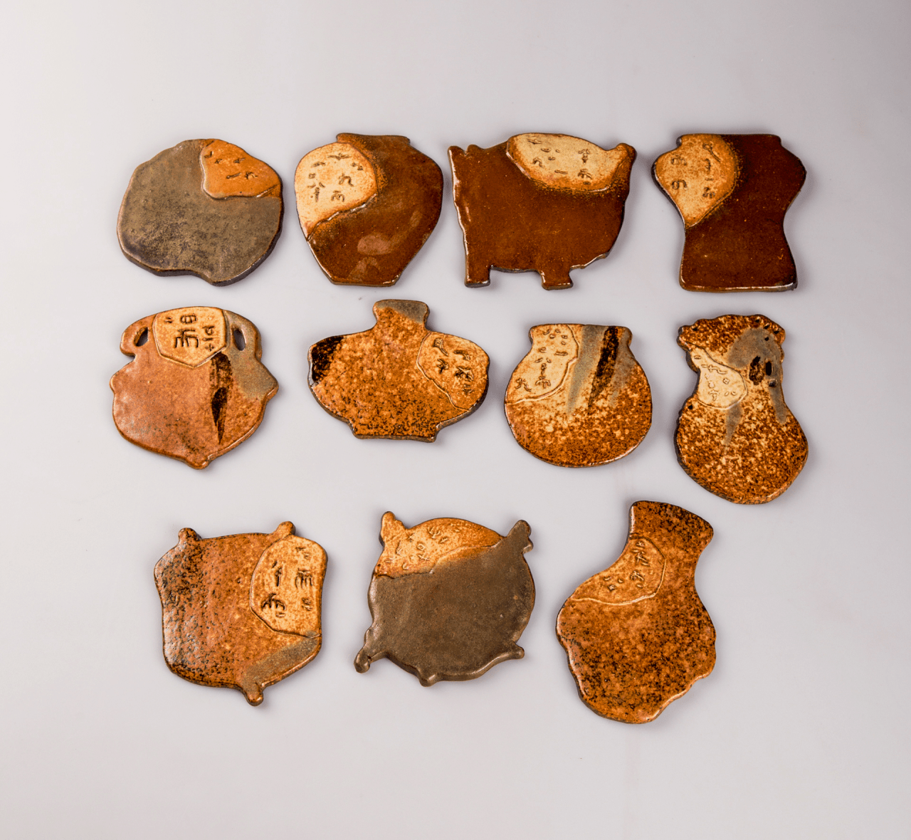 湘丝路——12星座里耶秦韵杯垫(张玉山供图)湘丝路——里耶秦简遇上