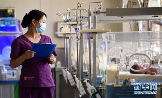 "准妈妈"护士:坚守岗位迎接护士节