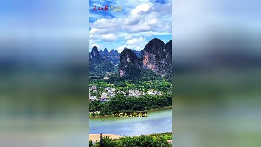 这位人大代表为啥举起了20元人民币？
