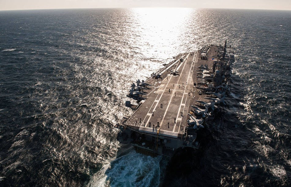 图为近日美国海军里根号航母战斗群在朝鲜半岛西部进行训练与演习
